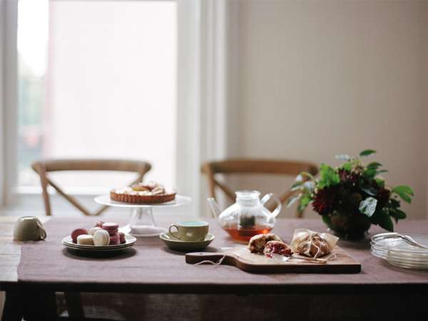Simple tea cups and calm table details in soft natural light